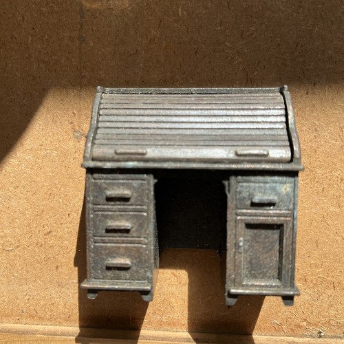 Die cast metal roll top - die,